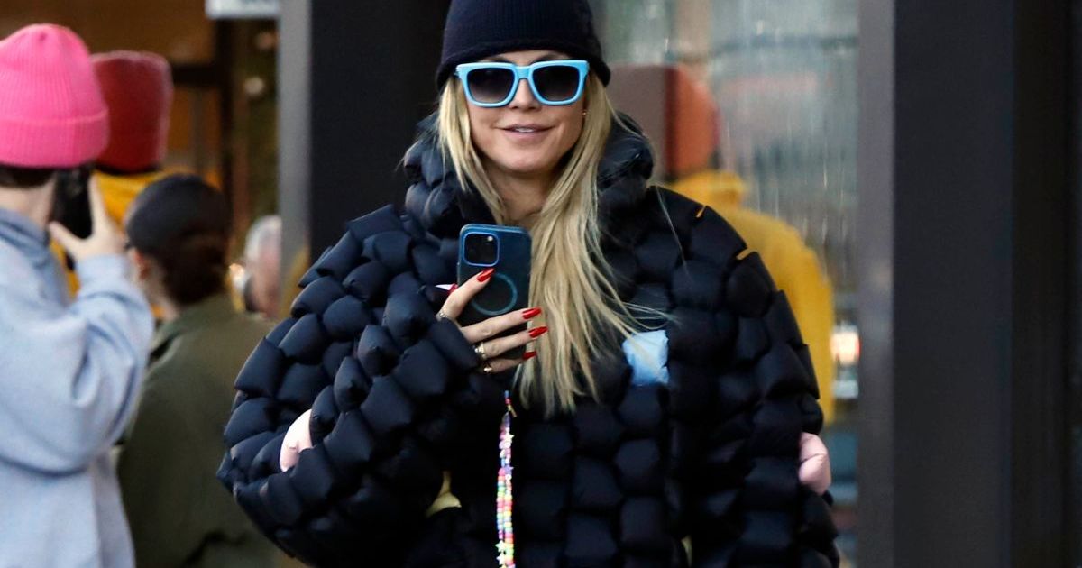 Heidi Klum Pairs All-Black Christmas Fit with Giant Fuzzy Boots Heidi Klum Pairs All-Black Christmas Fit with Giant Fuzzy Boots